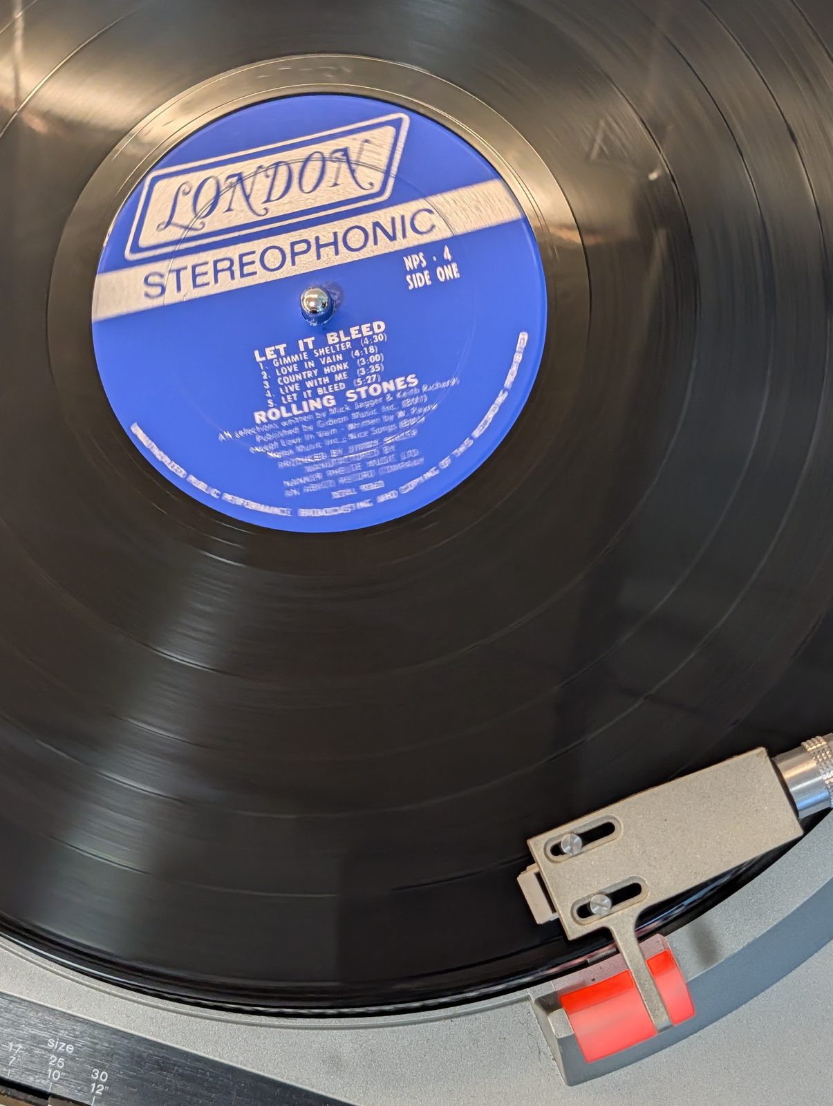 Let It Bleed London Stereophonic NPS 4 label on turntable — Side One tracklist visible